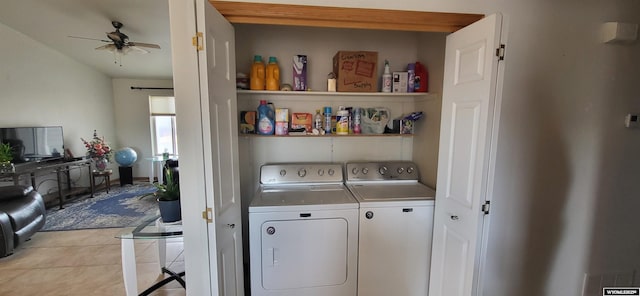 laundry area featuring light tile patterned flooring, separate washer and dryer, and ceiling fan