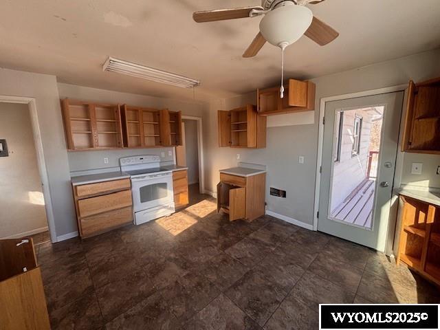 kitchen featuring ceiling fan and white range with electric cooktop