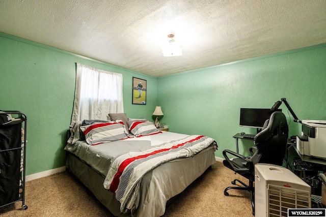 carpeted bedroom featuring a textured ceiling