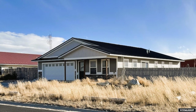 view of front of property featuring a garage