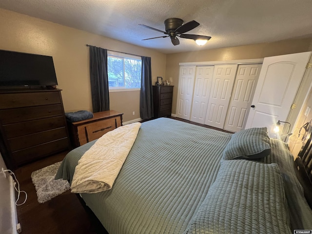 bedroom featuring ceiling fan, a closet, and a textured ceiling