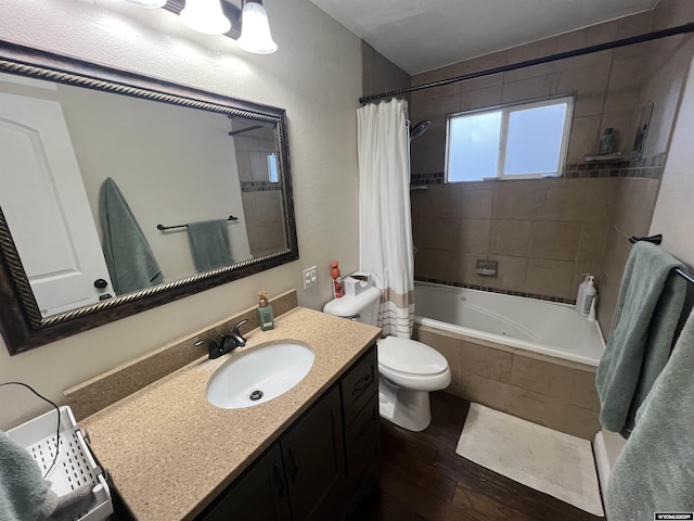 full bathroom featuring vanity, wood-type flooring, shower / bathtub combination with curtain, and toilet