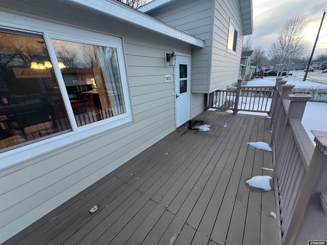 view of snow covered deck