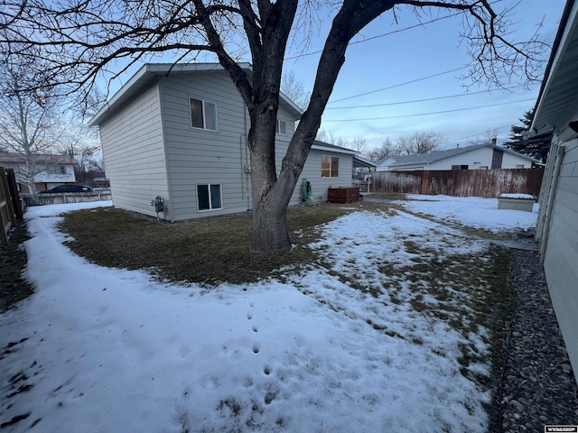 view of snow covered house