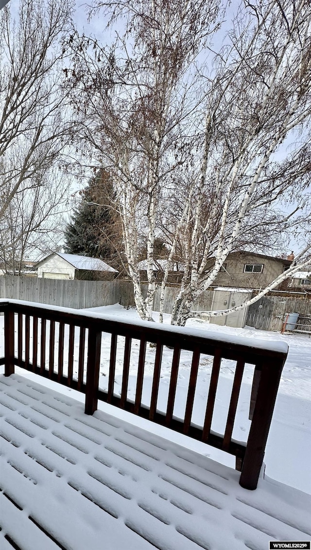 view of snow covered deck