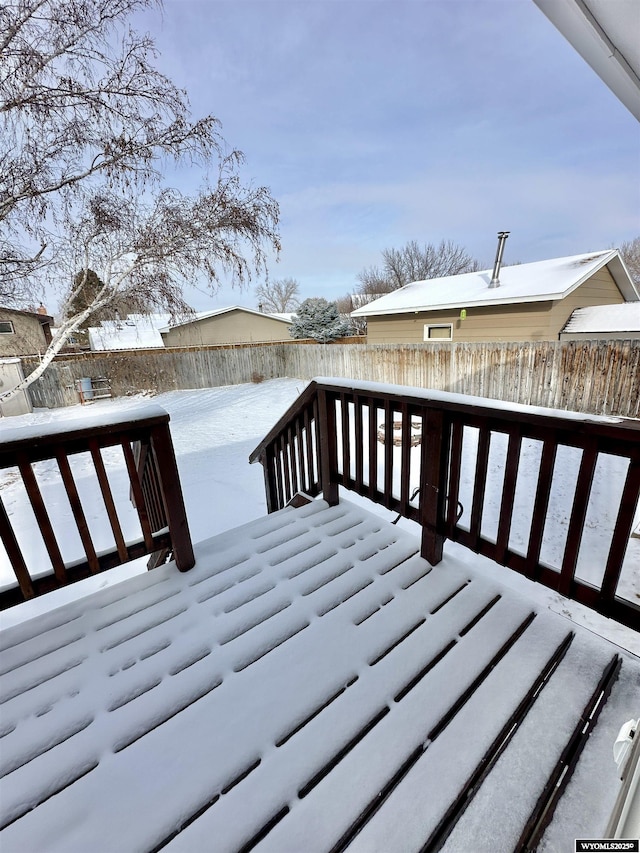 view of snow covered deck