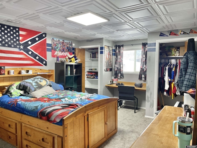 carpeted bedroom featuring two closets