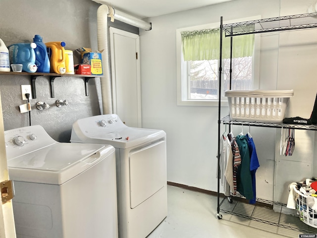 washroom with independent washer and dryer