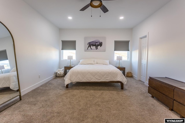 carpeted bedroom featuring ceiling fan