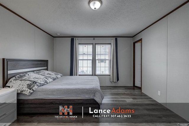 bedroom featuring crown molding, dark hardwood / wood-style flooring, and a textured ceiling