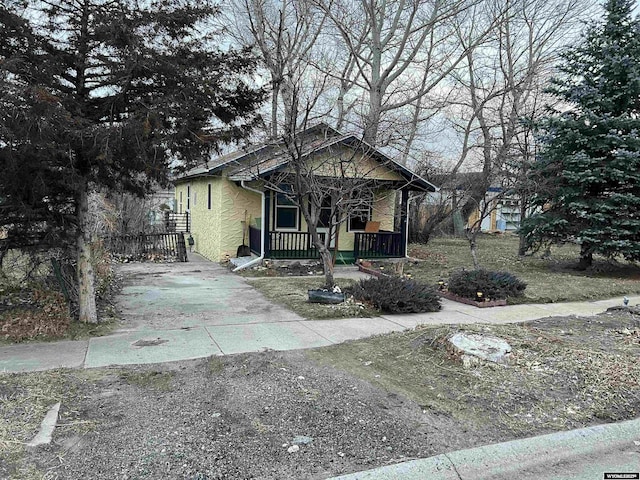 bungalow-style house featuring covered porch