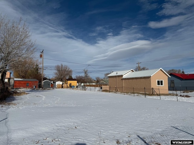 view of yard covered in snow