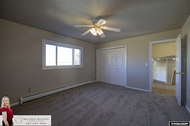 unfurnished bedroom featuring carpet floors, a ceiling fan, baseboards, baseboard heating, and a closet