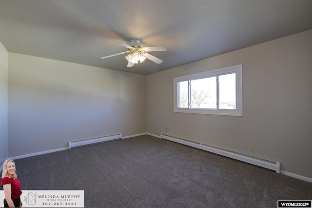 empty room with a baseboard radiator, a baseboard heating unit, dark colored carpet, and baseboards