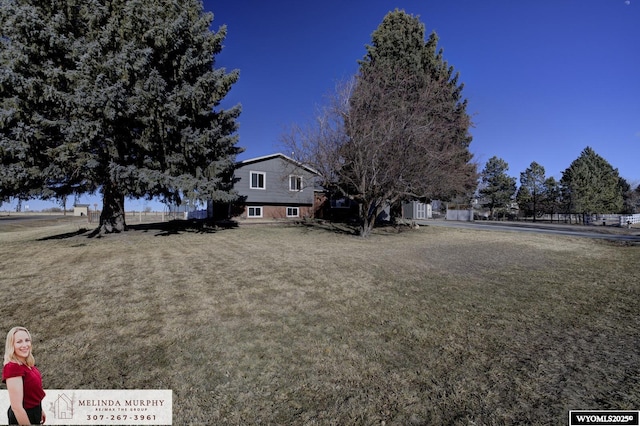 view of front of home with a front yard