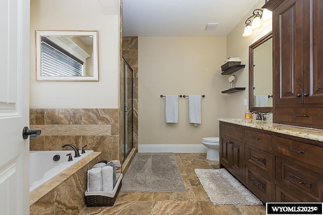 full bathroom with vanity, shower with separate bathtub, and toilet