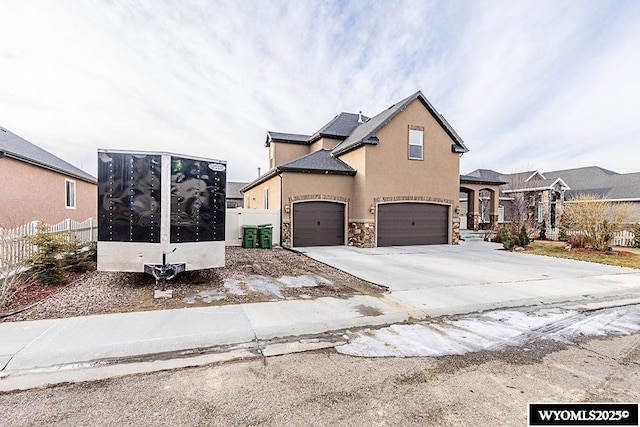 view of front of property with a garage