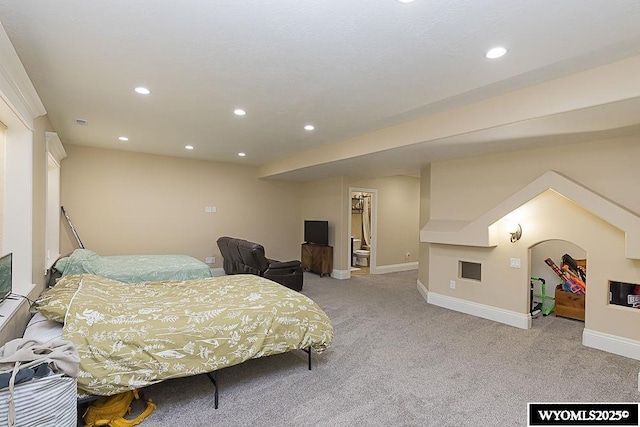 bedroom with light carpet