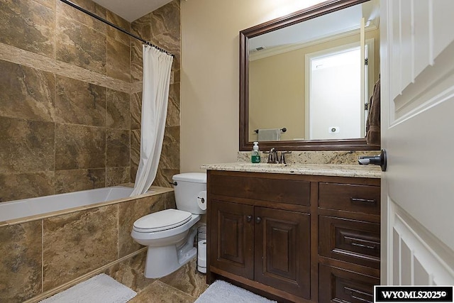 full bathroom featuring vanity, toilet, and shower / tub combo