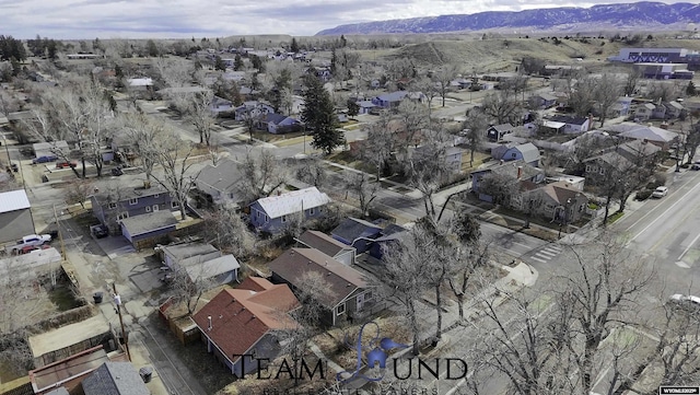 birds eye view of property featuring a mountain view