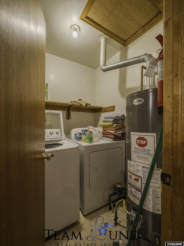 washroom featuring independent washer and dryer and gas water heater