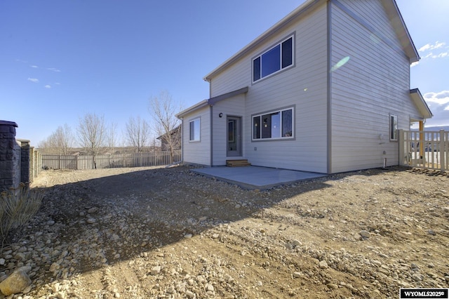 rear view of house with a patio area