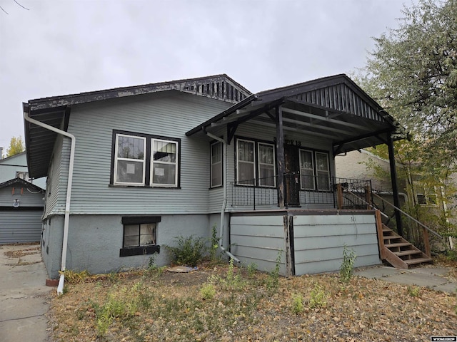 view of front of property featuring covered porch