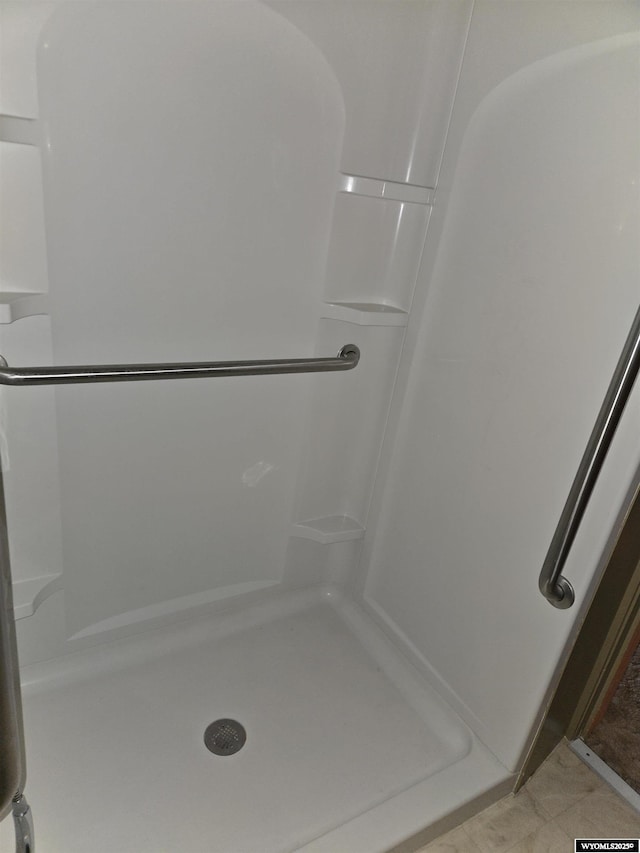 bathroom with a shower