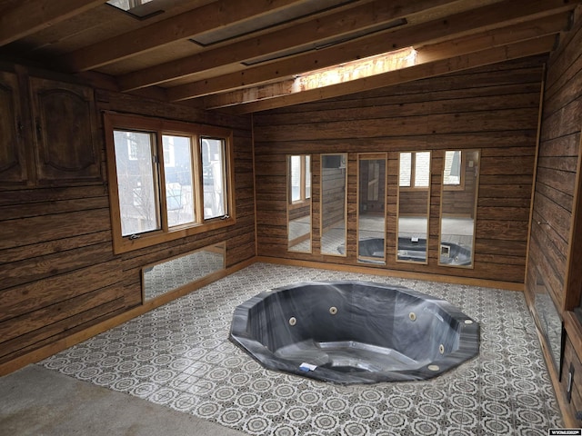 misc room with a jacuzzi and wooden walls