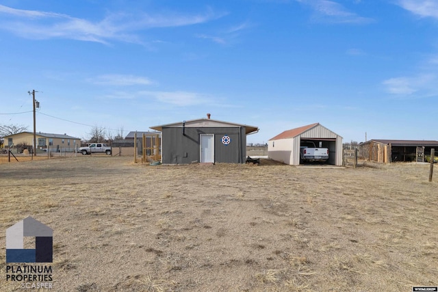 view of yard with an outdoor structure