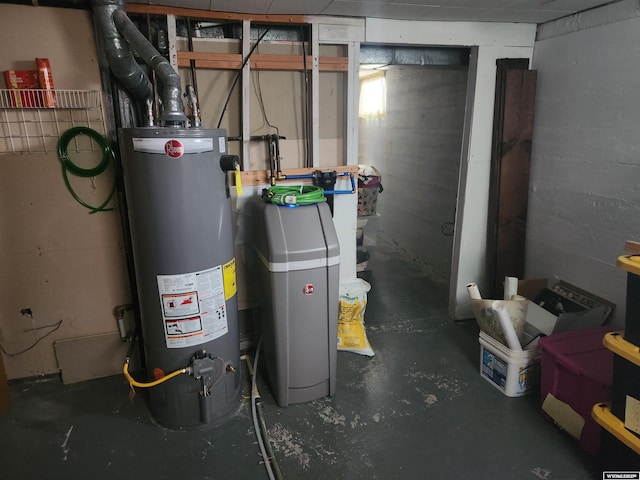 utility room featuring gas water heater