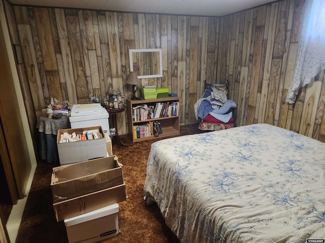 bedroom with wooden walls