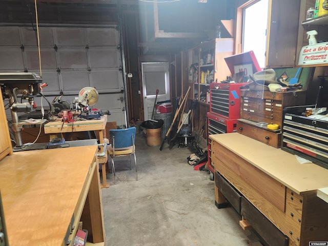 garage with a workshop area