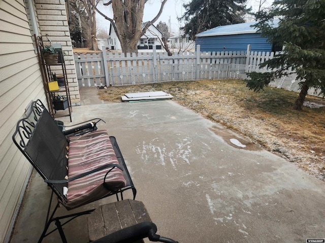 view of patio with fence