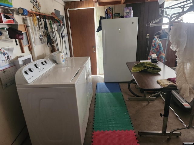 laundry area with laundry area and separate washer and dryer