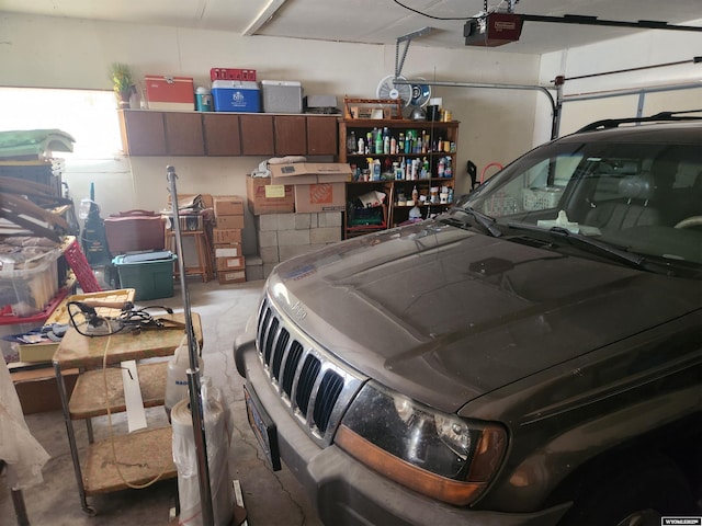 garage featuring a garage door opener