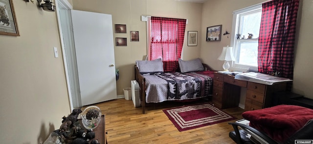 bedroom featuring light hardwood / wood-style flooring