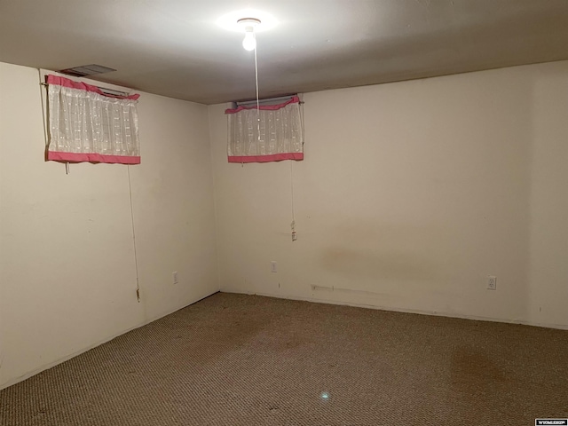 unfurnished room with carpet floors