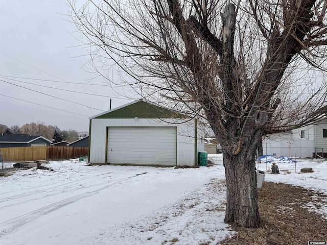 view of snow covered garage