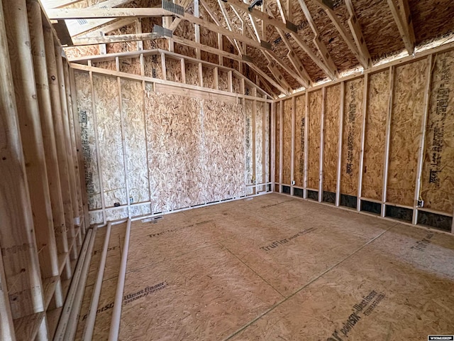 miscellaneous room featuring lofted ceiling