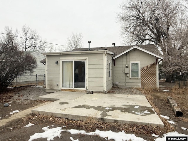 back of house with a patio area