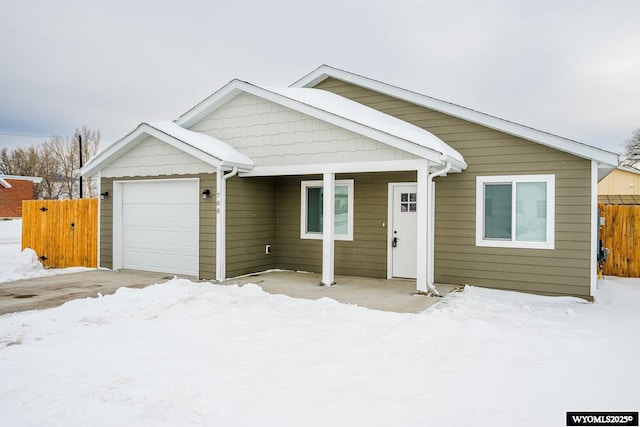 view of front of home with a garage