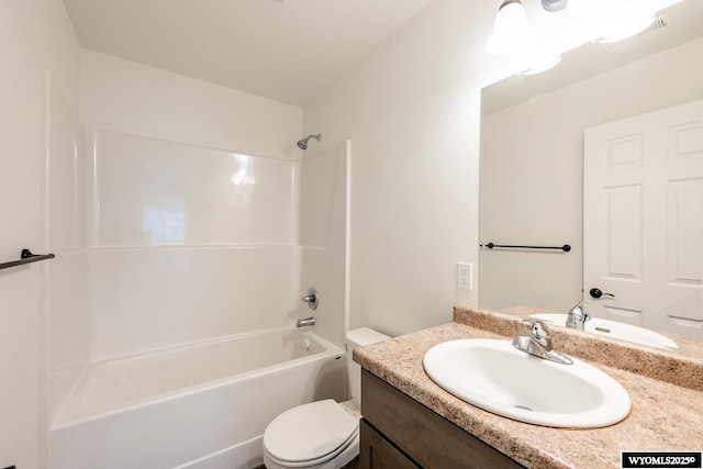 full bathroom featuring shower / bath combination, vanity, and toilet