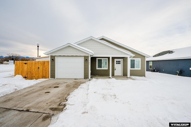 ranch-style home with a garage