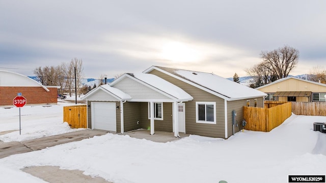 view of front of property featuring a garage