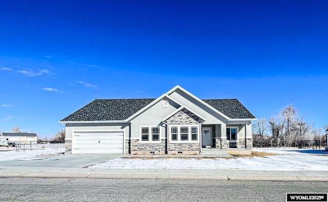 view of front of property featuring a garage