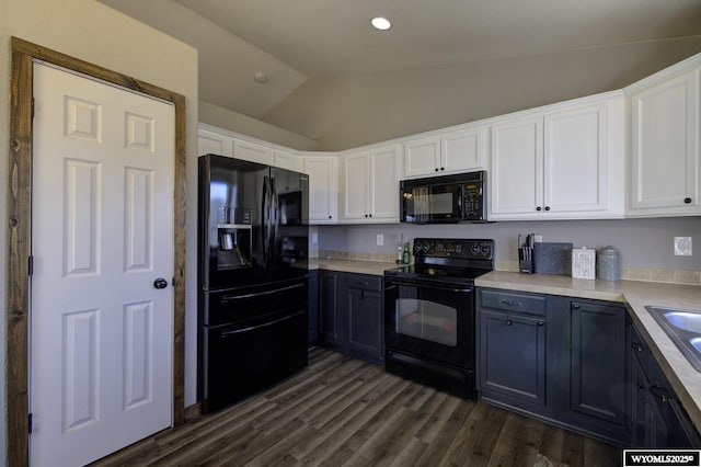 kitchen with white cabinets, lofted ceiling, and black appliances