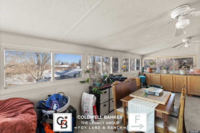 sunroom with vaulted ceiling and ceiling fan