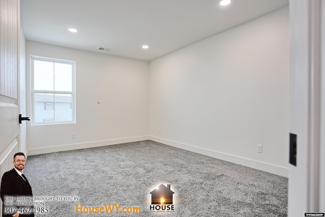 spare room featuring baseboards, carpet floors, visible vents, and recessed lighting