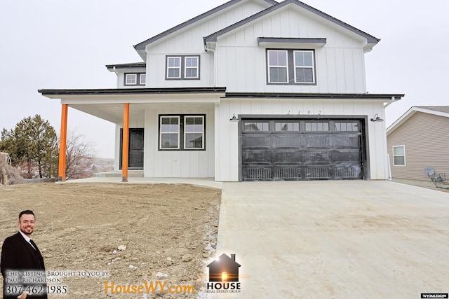 modern farmhouse style home featuring board and batten siding, covered porch, driveway, and a garage